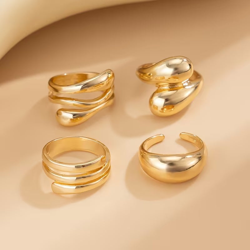 A Set Of 4 Elegant And Minimalist Golden Rings, Adjustable Open Rings For Women, Featuring A MultiLayer Spiral And Teardrop Geometric Design, Suitable For All Seasons